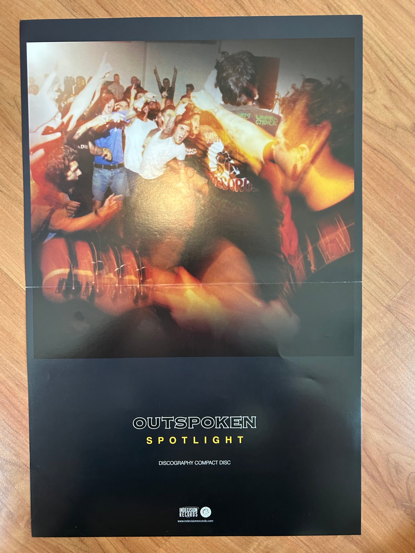 OUTSPOKEN - SPOTLIGHT POSTER