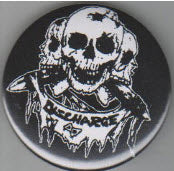 DISCHARGE - 3 SKULLS 2.25" BIG BUTTON