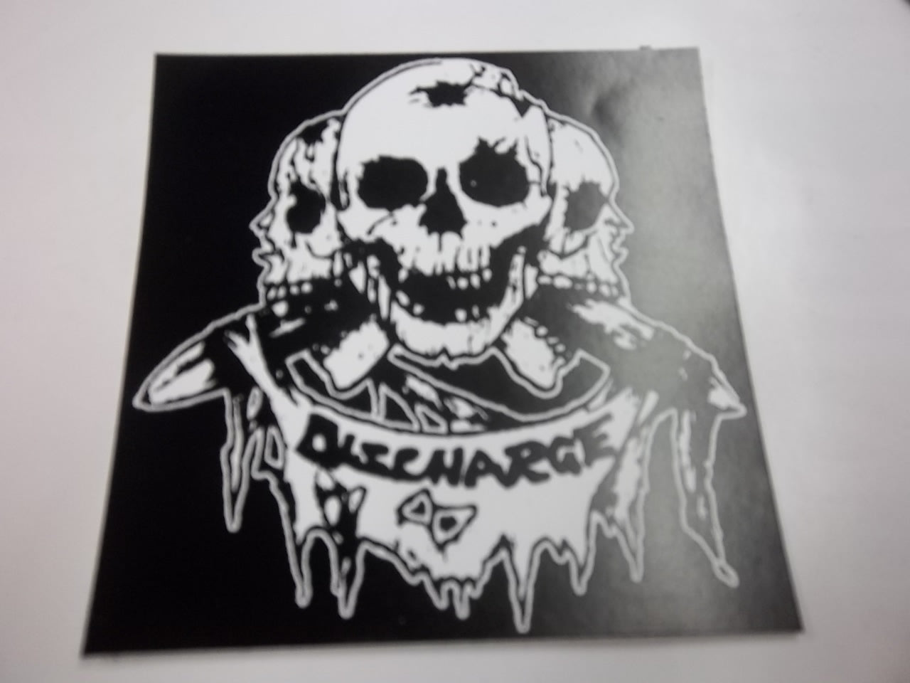 DISCHARGE - 3 SKULLS STICKER – Headline Records