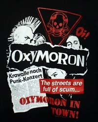 OXYMORON - IN TOWN 1" BUTTON